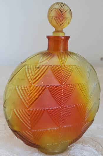 Vers Le Jour Perfume Bottle That Is A Close Call Copy of the Original Rene Lalique Design molded only MADE IN FRANCE to the underside Vers Le Jour Perfume Bottle That Is A Close Call Copy of the Original Rene Lalique Design molded only MADE IN FRANCE to the underside